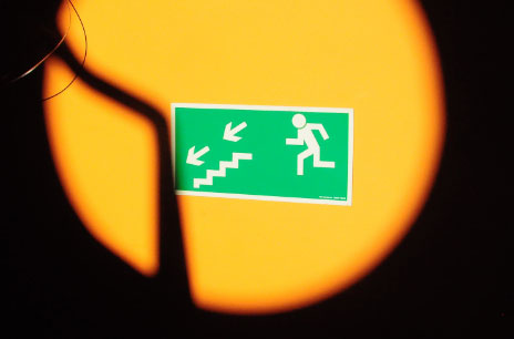 Emergency exit down stairs sign