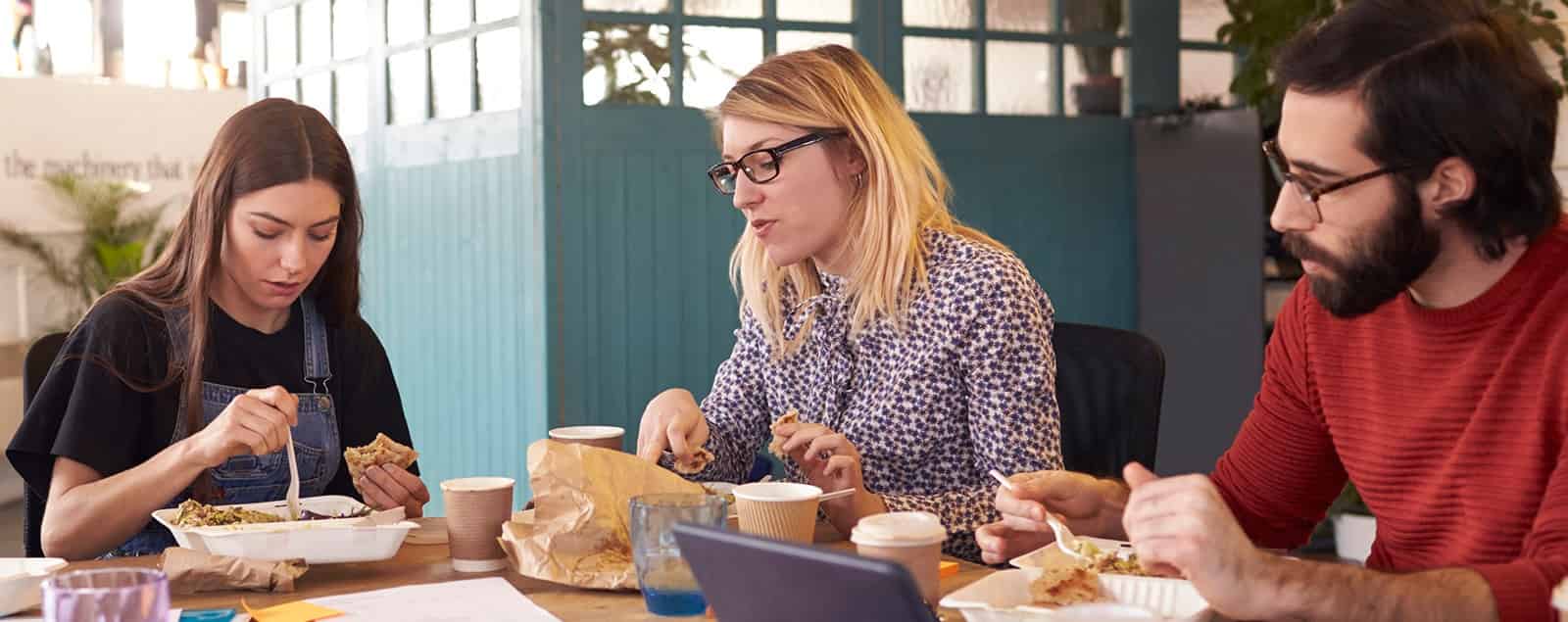 People having lunch at table