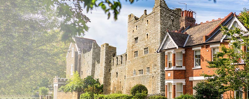 House next to a castle