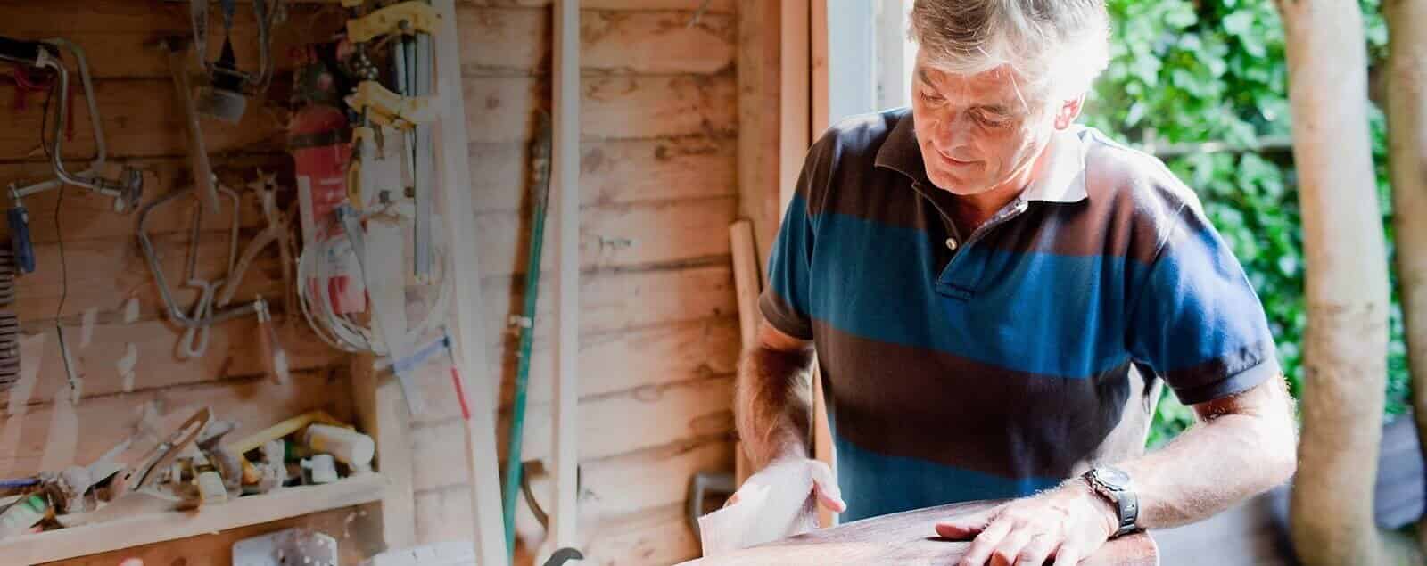 Man working with wood in workshop