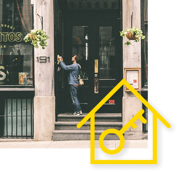 Keyholder response icon in front of a photo of a man outside a business