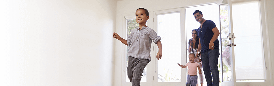 Family entering home