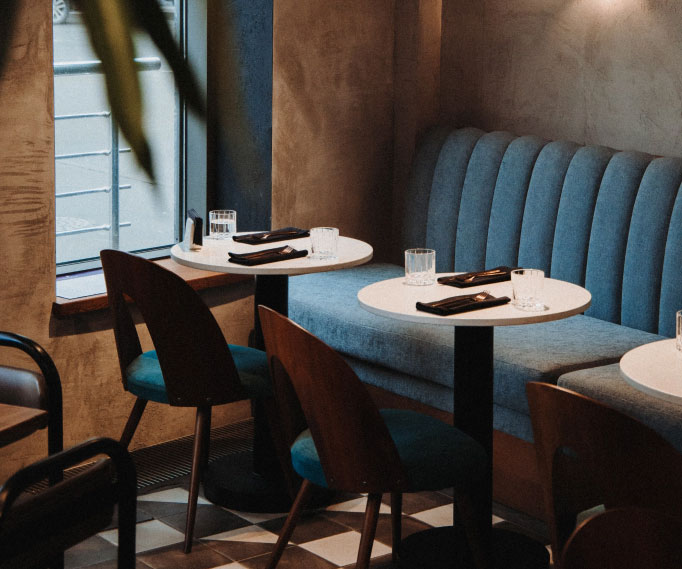 Tables in corner of a restaurant