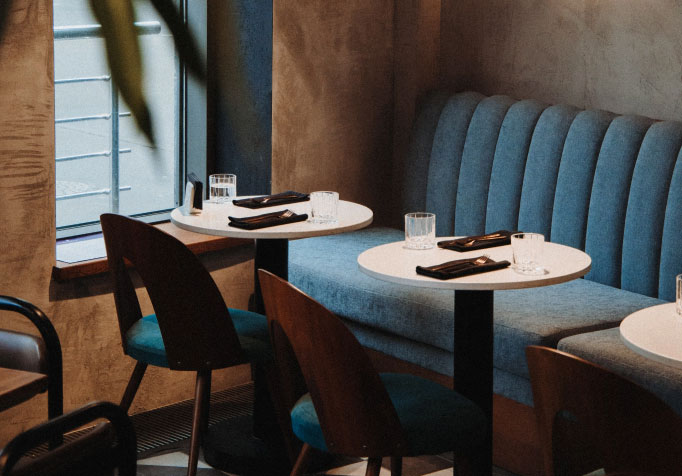 tables in corner of a restaurant